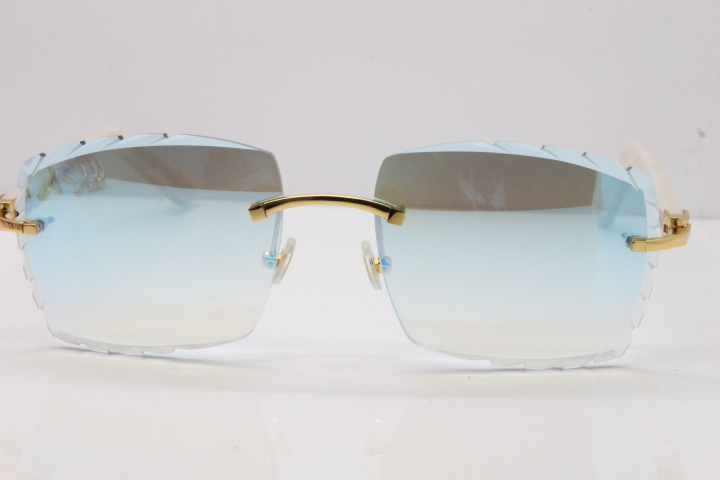 Cartier Rimless Aztec Arms 8300816 Carved Lens Sunglasses In Gold Ice Blue  Lens Frame Size：57-18-135mm (Eye-Bridge-Temple)