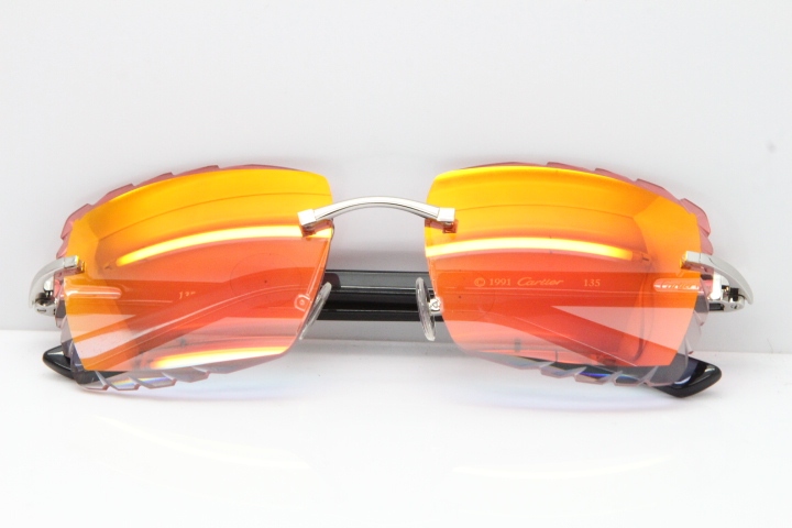 Cartier Rimless Aztec Arms 8300816 Carved Lens Sunglasses In Gold Red Mirror Lens