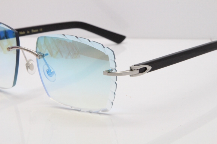 Cartier Rimless Aztec Arms 8300816 Carved Lens Sunglasses In Gold Ice Blue Lens