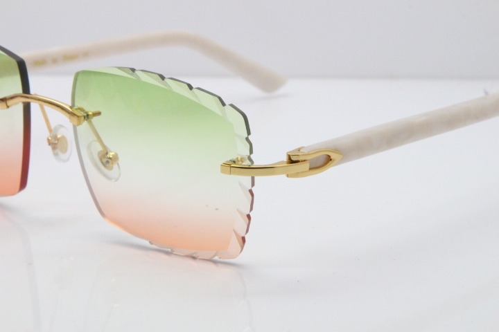 Cartier Rimless Aztec Arms 8300816 Carved Lens Sunglasses In Gold Green Mix Brown Lens