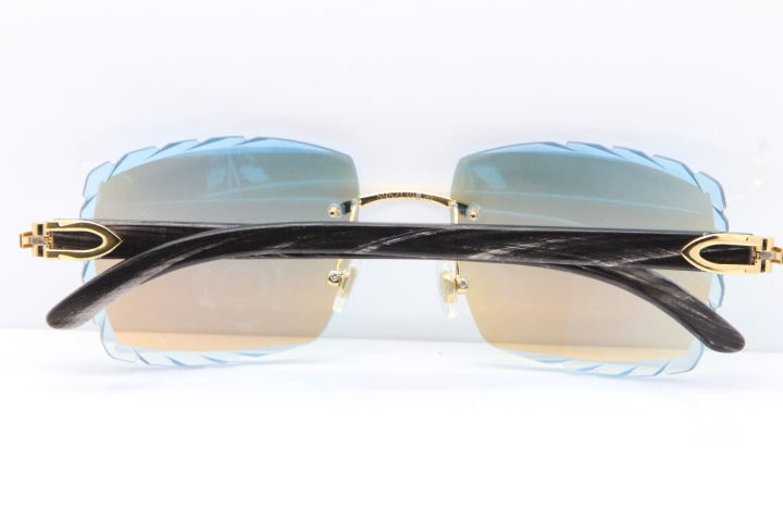 Cartier Rimless Original Black Flower Buffalo Horn 8300816 Sunglasses In Gold Ice Blue Carved Lens