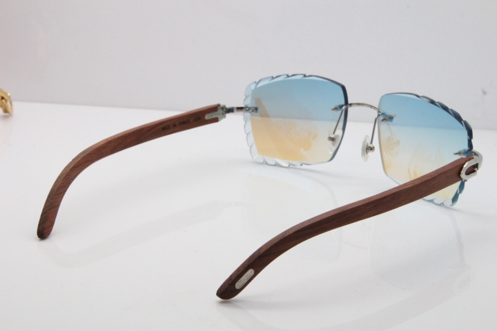 Cartier Rimless 8300816 Original Wood Sunglasses In Gold Ice Blue Carved Lens