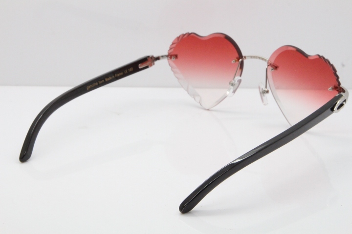 Cartier Rimless 3524012 Heart Black Buffalo Horn Sunglasses in Gold Red Lens