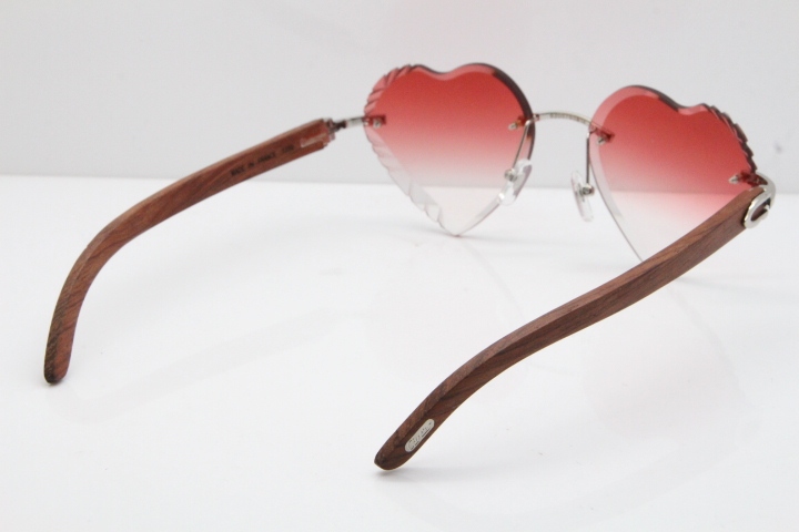 Cartier Rimless 3524012 Heart Original Pear Wood Sunglasses In Gold Red Lens