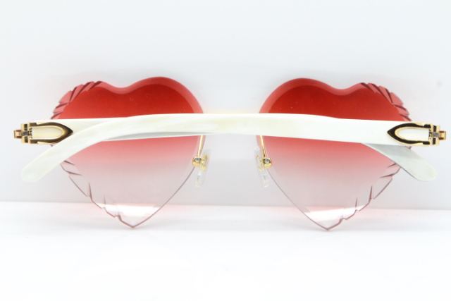 Cartier Rimless 3524012 Heart White Inside Black Buffalo Horn Sunglasses in Gold Red Lens