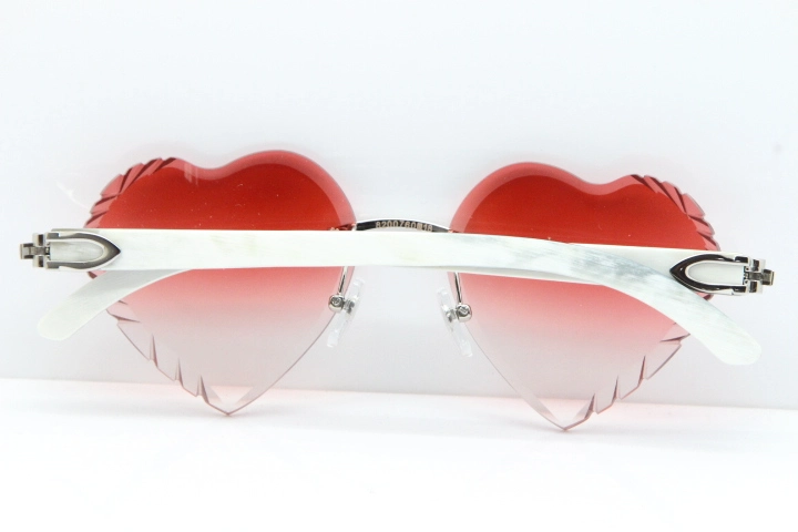 Cartier Rimless 3524012 Heart White Inside Black Buffalo Horn Sunglasses in Gold Red Lens