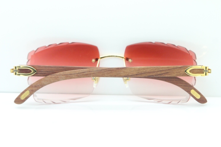 Cartier Rimless 8300816 Pear Wood Sunglasses In Gold Red Lens