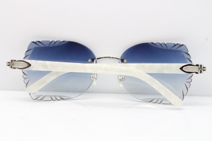 Cartier Rimless T8200762 Marble White Aztec Arms Sunglasses In Gold Blue Lens