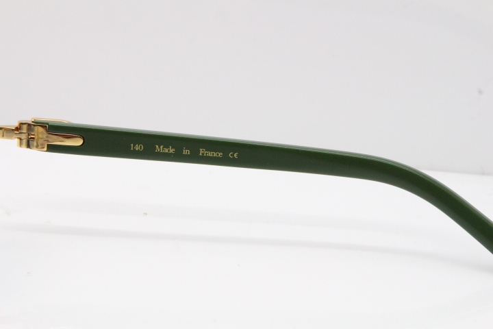 Cartier Rimless T8200762 Green Aztec Arms Sunglasses In Gold Blue Lens 