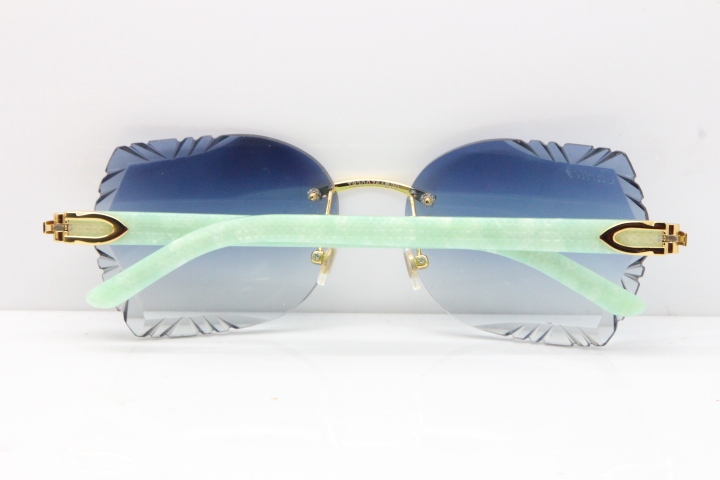 Cartier Rimless T8200762 Marble Green Aztec Arms Sunglasses In Gold Blue Lens