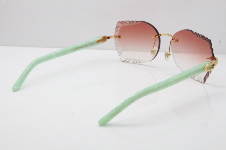 Cartier Rimless T8200762 Marble Green Aztec Arms Sunglasses In Gold Pink Lens