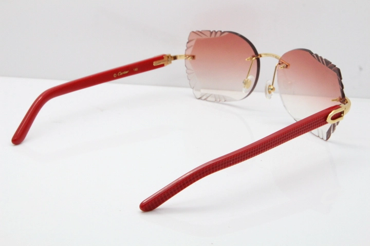 Cartier Rimless T8200762 Red Aztec Arms Sunglasses In Gold Pink Lens