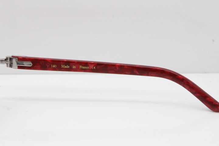 Cartier Rimless T8200762 Marble Red Aztec Arms Sunglasses In Gold Gray Lens