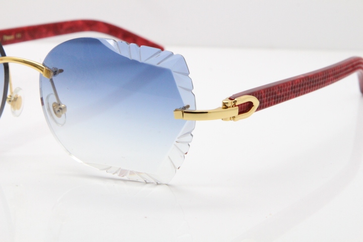 Cartier Rimless T8200762 Marble Red Aztec Arms Sunglasses In Gold Blue Lens