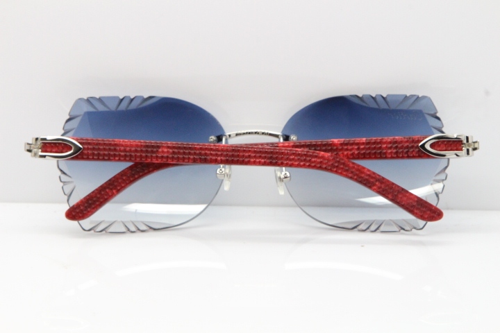 Cartier Rimless T8200762 Marble Red Aztec Arms Sunglasses In Gold Blue Lens