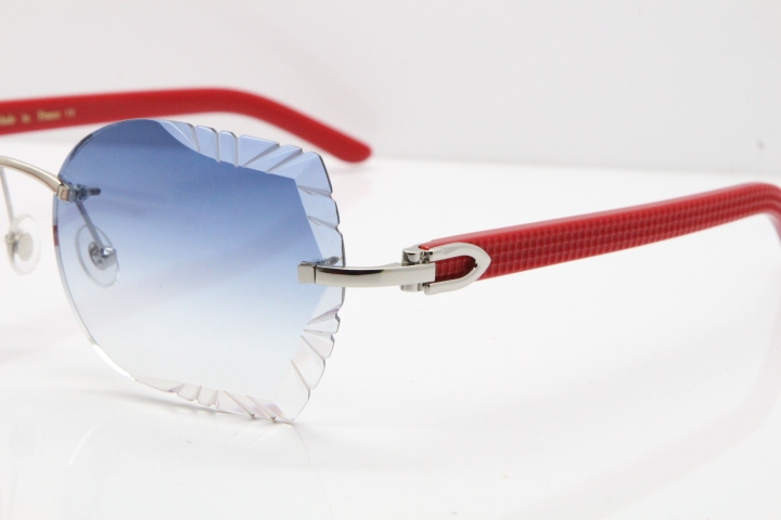 Cartier Rimless T8200762 Red Aztec Arms Sunglasses In Gold Blue Lens