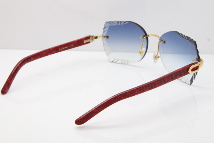 Cartier Rimless T8200762 Marble Red Aztec Arms Sunglasses In Gold Blue Lens