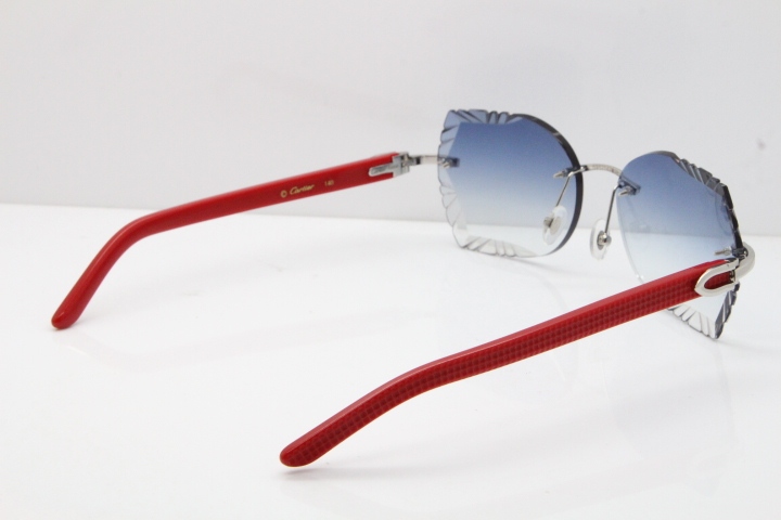 Cartier Rimless T8200762 Red Aztec Arms Sunglasses In Gold Blue Lens