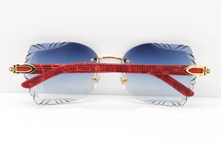 Cartier Rimless T8200762 Marble Red Aztec Arms Sunglasses In Gold Blue Lens