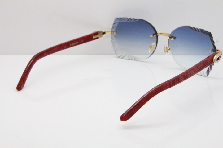 Cartier Rimless T8200762 Big Diamond Marble Red Aztec Arms Sunglasses In Gold Blue Lens