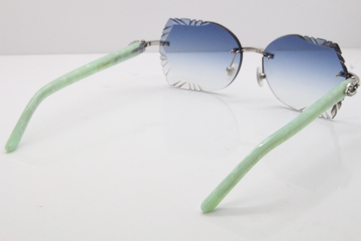 Cartier Rimless T8200762 Big Diamond Marble Green Aztec Arms Sunglasses In Gold Blue Lens