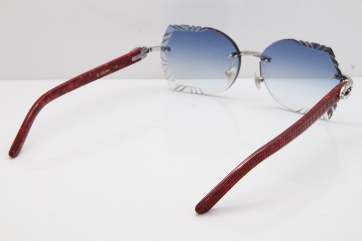 Cartier Rimless T8200762 Big Diamond Marble Red Aztec Arms Sunglasses In Gold Blue Lens