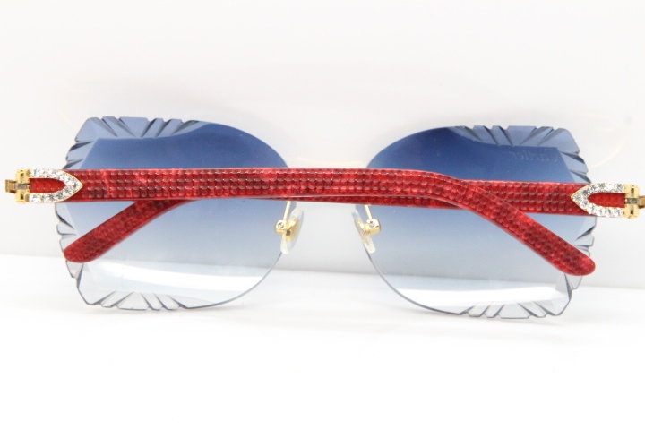 Cartier Rimless T8200762 Big Diamond Marble Red Aztec Arms Sunglasses In Gold Blue Lens