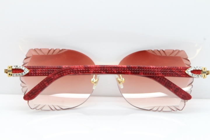 Cartier Rimless T8200762 Big Diamond Marble Red Aztec Arms Sunglasses In Gold Pink Lens