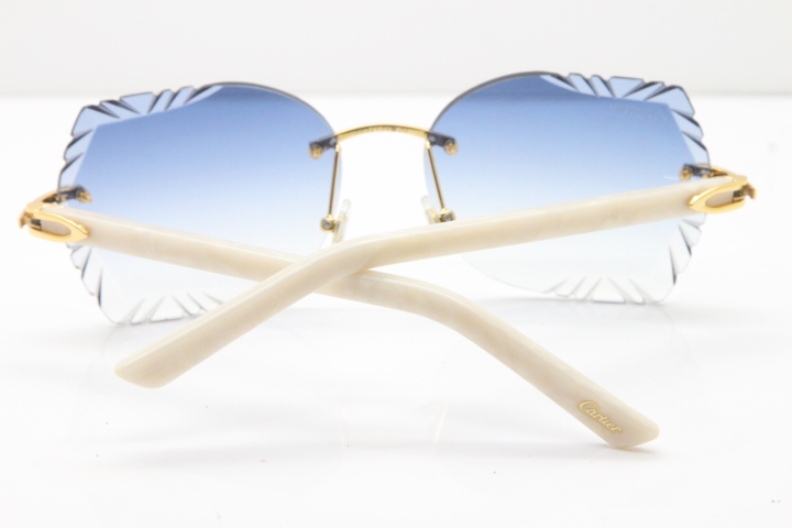 Cartier Rimless T8200762 White Aztec Arms Sunglasses In Gold Blue Lens