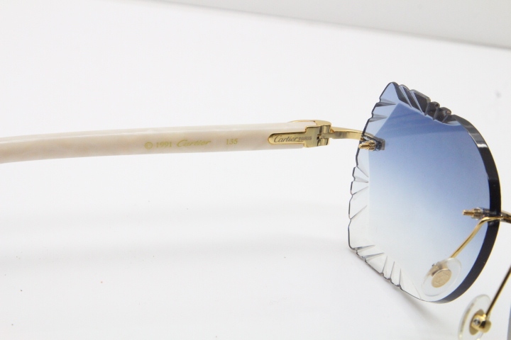 Cartier Rimless T8200762 White Aztec Arms Sunglasses In Gold Blue Lens