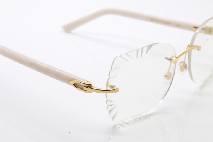 Cartier Rimless T8200762 White Aztec Arms Sunglasses In Gold Clear Lens  