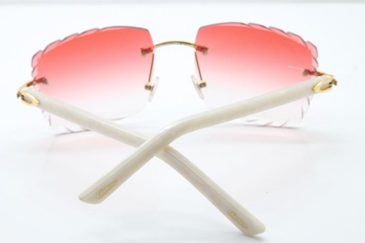 Cartier Rimless 8300816 White Aztec Arms Sunglasses In Gold Red Lens