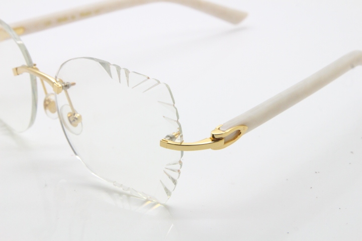 Cartier Rimless T8200762 White Aztec Arms Sunglasses In Gold Clear Lens  