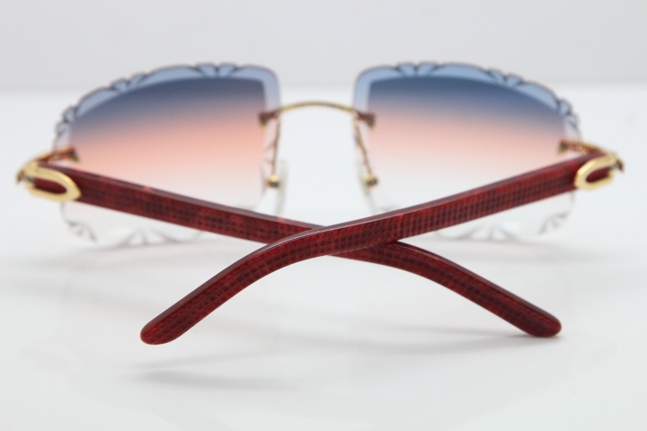 Cartier Rimless 8300816 Marble Red Aztec Arms Sunglasses In Gold Orange Lens