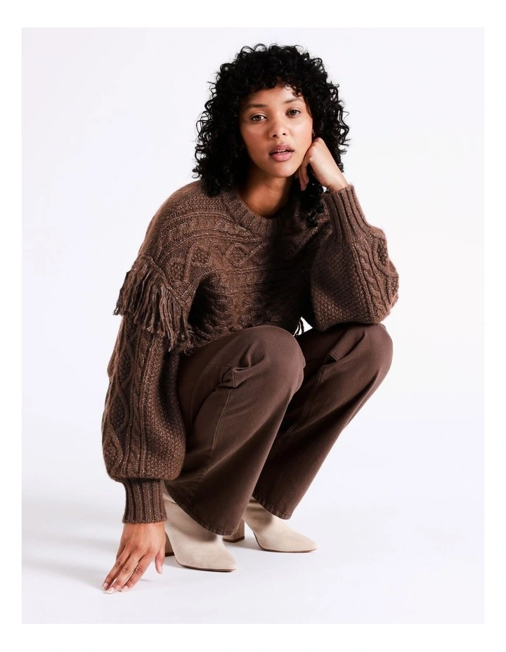 Brown long sleeve fringed knitted pullover top with long sleeves and loose fit