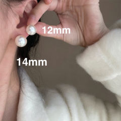 Perfectly round pearl stud earrings