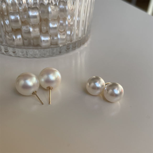 Perfectly round pearl stud earrings