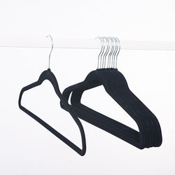Inspring wholesale velvet hanger black flocking clothing rack