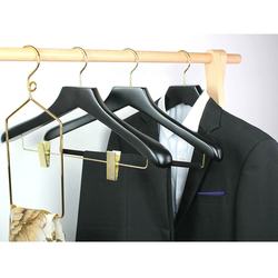 Black hotel wooden hangers with gold hook and clips
