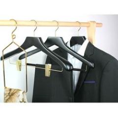 Black hotel wooden hangers with gold hook and clips