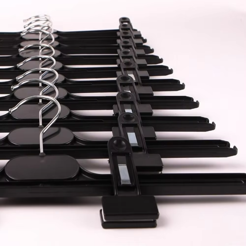 Cheap plastic pant hangers with clips