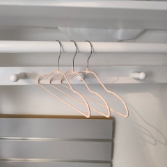 Children size heavy duty pink infant metal coat hangers