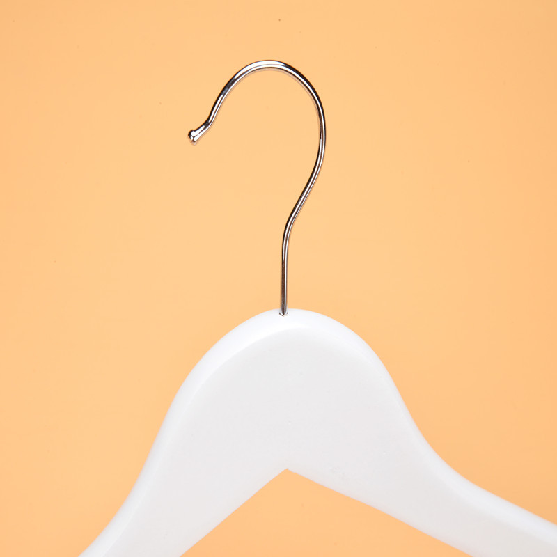 White wooden infant baby hangers