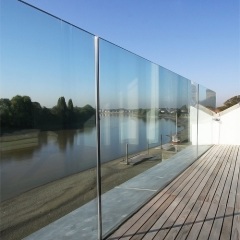 Frameless modern glass railing with u channel base fixings