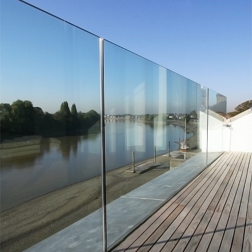 Frameless modern glass railing with u channel base fixings