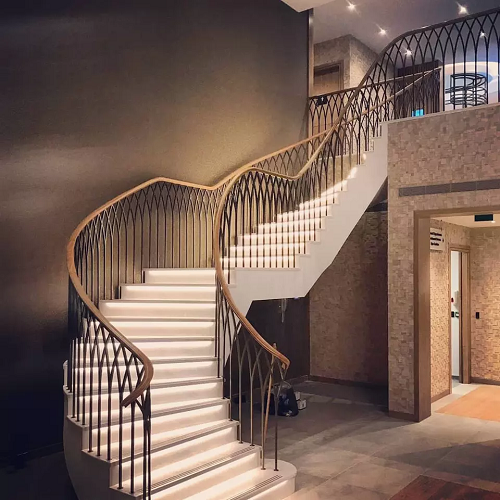 Australian Style Interior Double Plate Beam Marble Step Curved Stairs with Steel Balustrades Handrails for Villa