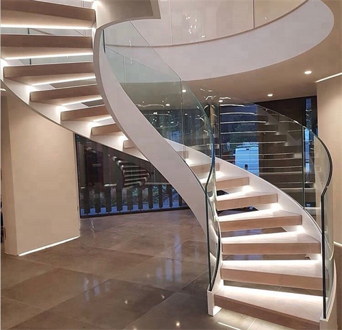 Curved staircase with glass balustrade and red oak treads indoor use arc stairs