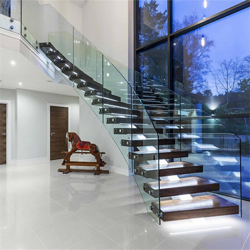 Curved staircase with glass balustrade and red oak treads indoor use arc stairs