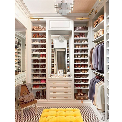 Luxury U shape walk-in closet with dressing table and island