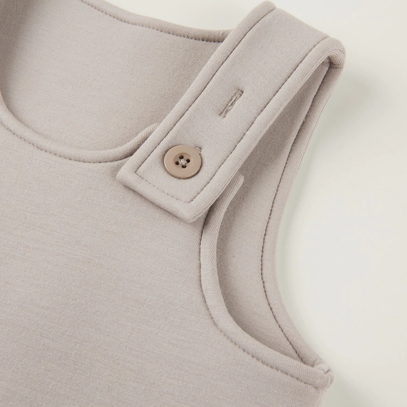 Eco-friendly baby dungarees made from polyester and viscose blend